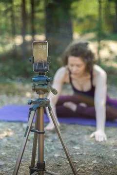 Close-up of a phone while doing yoga Stock Photos