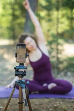 Close-up of a phone while doing yoga Stock Photos
