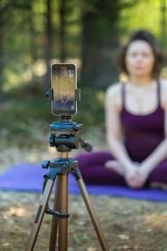 Close-up of a phone while doing yoga Stock Photos