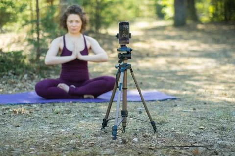 Close-up of a phone while doing yoga Foto stock