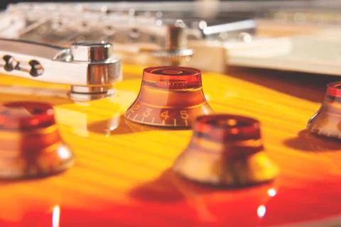 Close-up photo with detail of the knobs to adjust the volume and tone of a vi Stock Photos