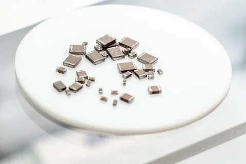 Close up photo: electronics components on white plate 写真素材