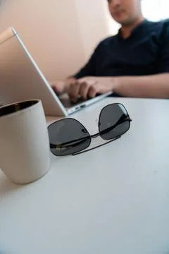 Close-up photo of a programmer typing on a laptop 写真素材