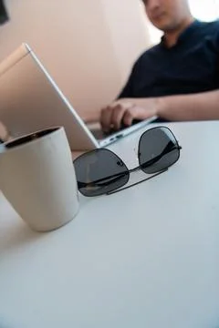 Close-up photo of a programmer typing on a laptop 写真素材