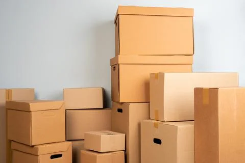 Close up photo of a stack of moving boxes 写真素材