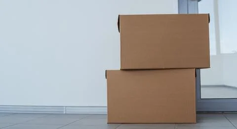 Close up photo of a stack of moving boxes Stock Photos