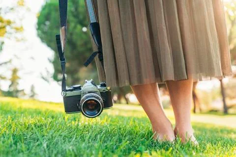 Close up of a photographer with her camera. Stock Photos