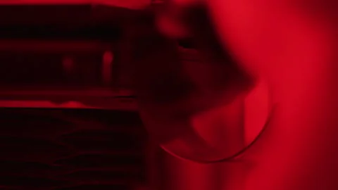Close up of a photographer using an enlarger Vídeo Stock 214859094