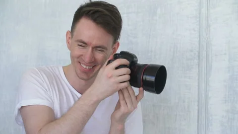 Close-up of a photographer at work. Stock Footage 90313087