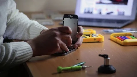 Close-up photos showing process of mobile phone repair, changing the screen Stock Footage 70139403