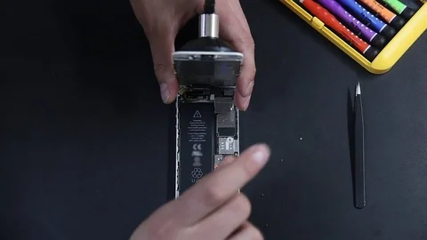 Close-up photos showing process of mobile phone repair, changing the screen Stock Footage 70139443