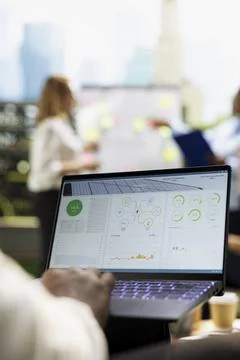 Close-up of photovoltaics data on laptop software for solar energy Stock Photos