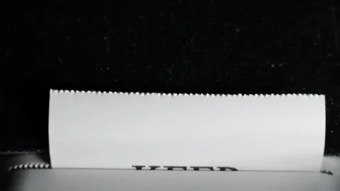 Close-up of the phrase "KEEP MOVING FORWARD" printed on white paper Stock Footage 306587517