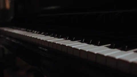 Close-up of piano keys frontal view. Side view of piano keyboard. Piano keyboard Stock Footage 112674593