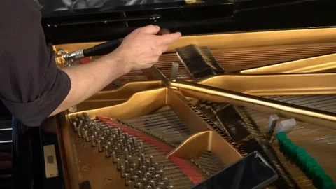 Close up piano tuning Stock Footage 105886122