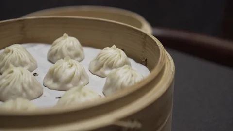 Close up of picking up a dumpling. slow motion Video stock 78885743