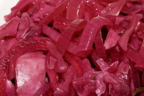 Close up of pickled chopped red cabbage on white background Foto stock