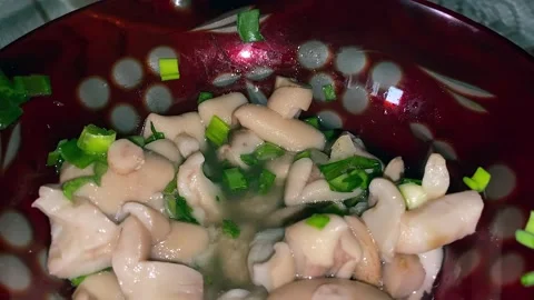 Close-up of pickled mushrooms in a plate. 動画素材 237770239