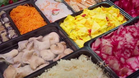 Close-up of pickled vegetables on display in a store Video stock 301388664