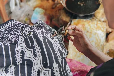 Close up picture of drawing the design pattern of Indonesian batik tulis fa.. Stock Photos