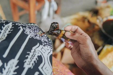 Close up picture of drawing the design pattern of Indonesian batik tulis fa.. Stock Photos