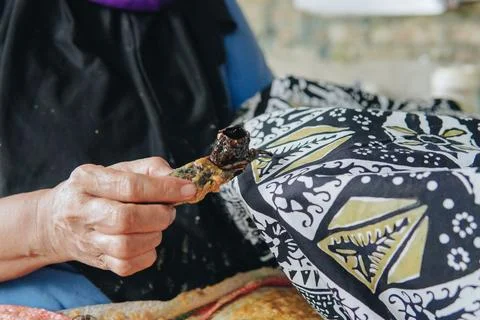 Close up picture of drawing the design pattern of Indonesian batik tulis fa.. Stock Photos