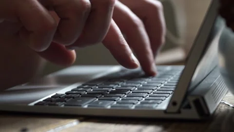 Close up picture of a hands typing on a keyboard Video stock 130790164