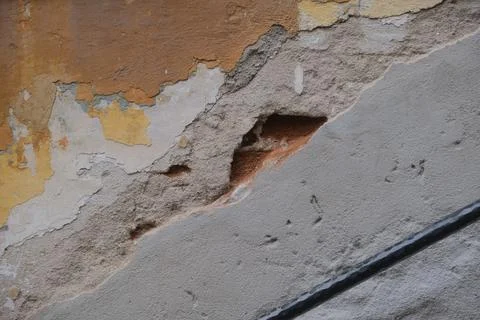 Up close picture of an old wall with a railing Stock Photos