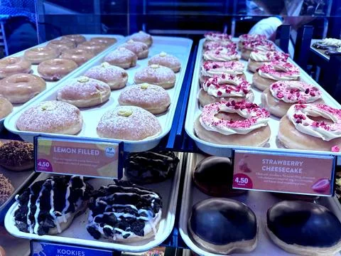 Close up picture of two types of cheesecakes on display Stock Photos
