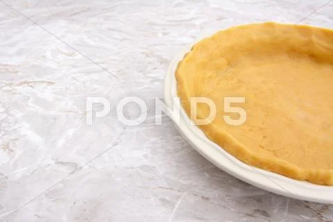 Close-up of pie dish lined with pastry Stock Photos