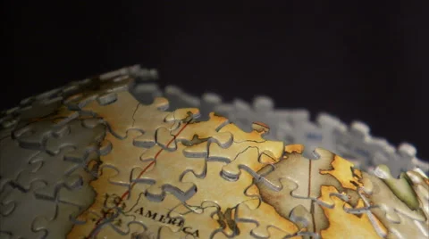 Close up of piece added to 3D globe puzzle. Stock Footage 52326231