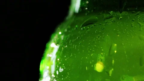 Close-up of a piece of a bottle of beer. The caplets are covered. It fights Stock Footage 85348845
