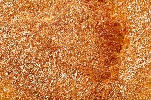 A close up of a piece of bread with a lot of sugar on it Foto stock