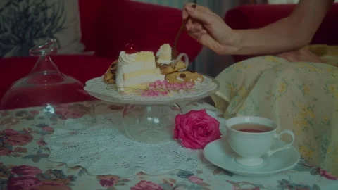 A close-up of a piece of cherry cake, under a glass cover. an appetizing piece Stock-Footage 251616961