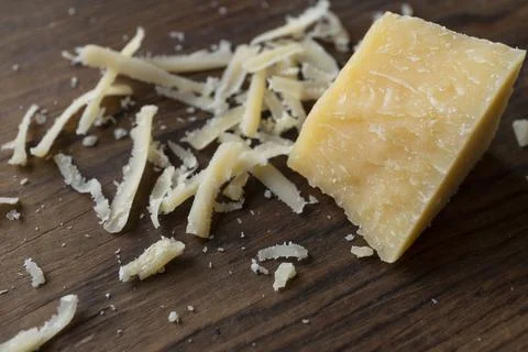 Close-up of a piece of parmesan Photos