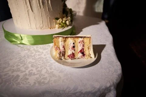 Close up piece of wedding layer cake Stock Photos