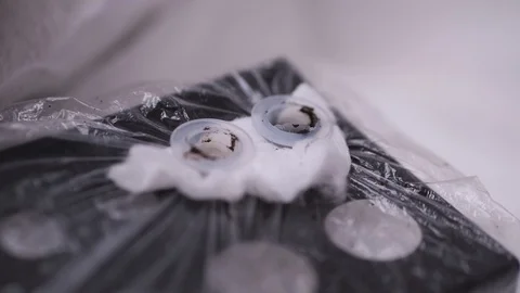 Close-up of pigment intake machine. Permanent makeup procedure. 4K Slow Mo Stock Footage 106896861