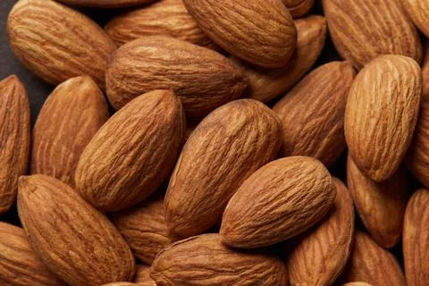 Close up of a pile of almonds as background. 스톡 사진