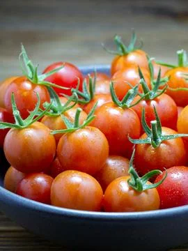 Close up of pile of cherry tomatoes. Stock Photos