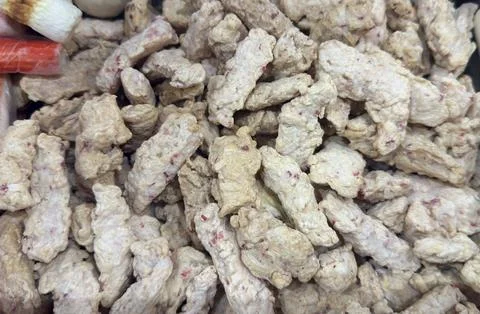 Close-up of a Pile of Dried Ginger Root Pieces for Culinary Purposes. Stock Photos