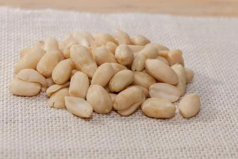 Close up of pile of peanuts on sack Stock Photos