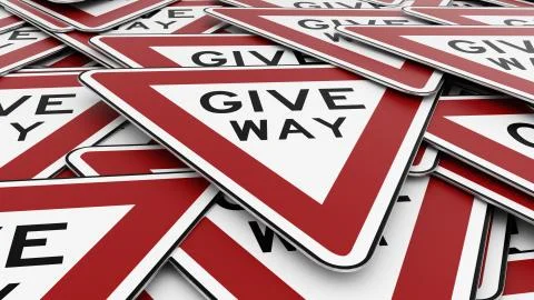 Close Up of Pile of Red, White, and Black Give Way Traffic Signs Ilustração Stock