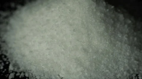 Close up of a pile of salt rotating Stock Footage 232149107