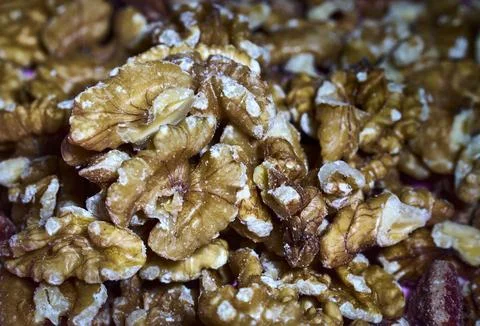 Close-up of piled shelled walnuts Photos