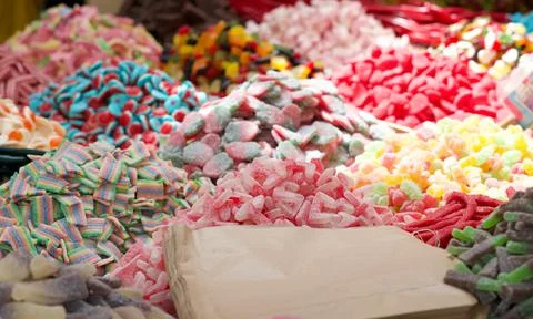 Close up of piles of colorful jelly candies in a market Stock Photos