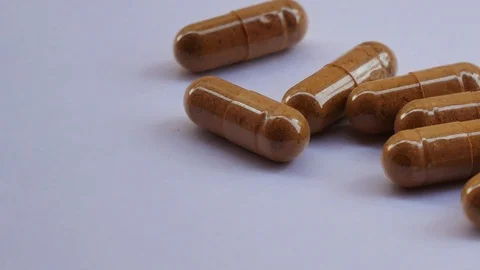 Close up pill on white. Stock Footage 129377162