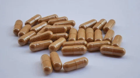 Close up pill on white. Stock Footage 129377195