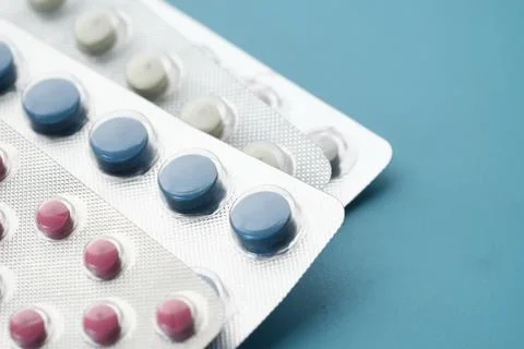Close up of pills of blister pack on table Stock Photos