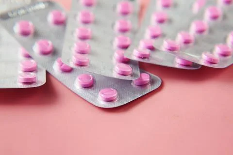 Close up of pills of blister pack on table Stock Photos