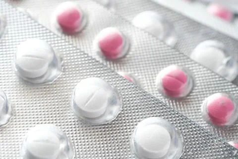 Close up of pills of blister pack on table Stock Photos